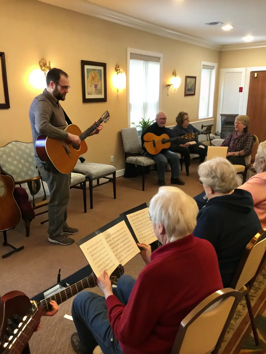 A group of participants actively engaged in a BERRY GOSPEL blues workshop, learning guitar techniques from an instructor, highlighting the educational aspect of the organization's activities.